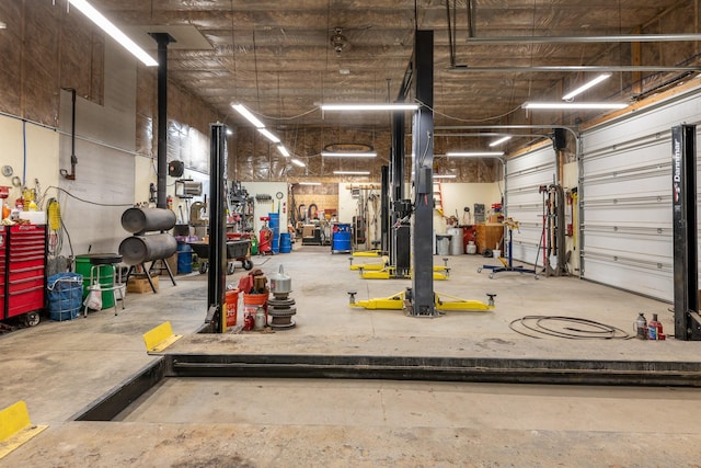 garage with a workshop area