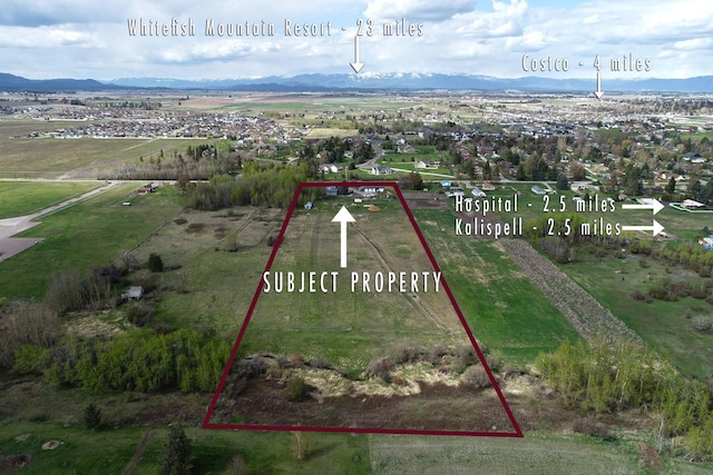 view of property location with property boundaries highlighted and mountains