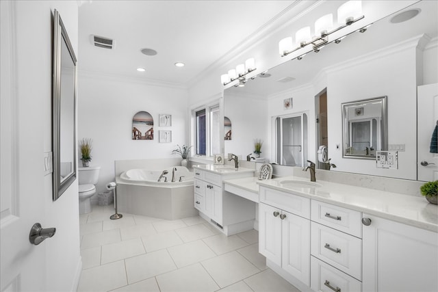 bathroom with vanity, toilet, ornamental molding, and a tub