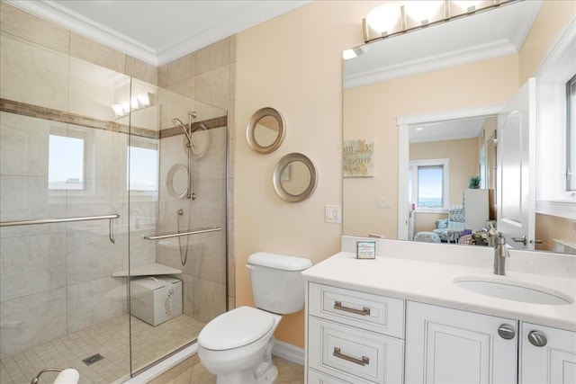 bathroom featuring vanity, walk in shower, tile patterned flooring, toilet, and ornamental molding