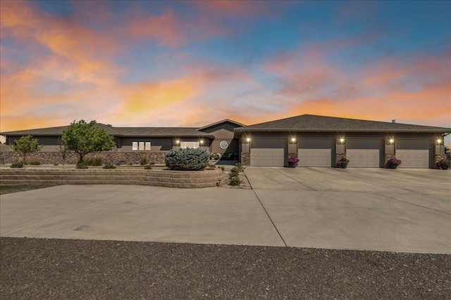 prairie-style home featuring a garage