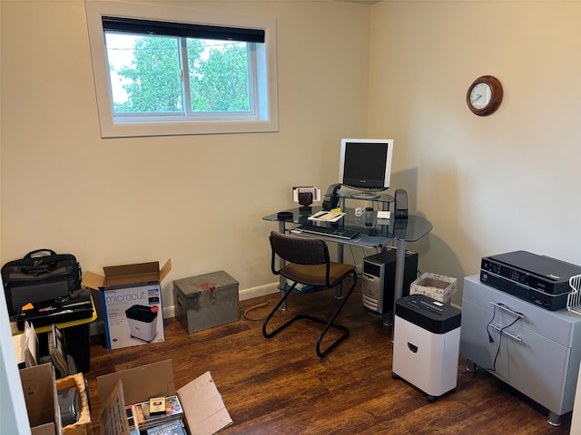 office with dark hardwood / wood-style flooring