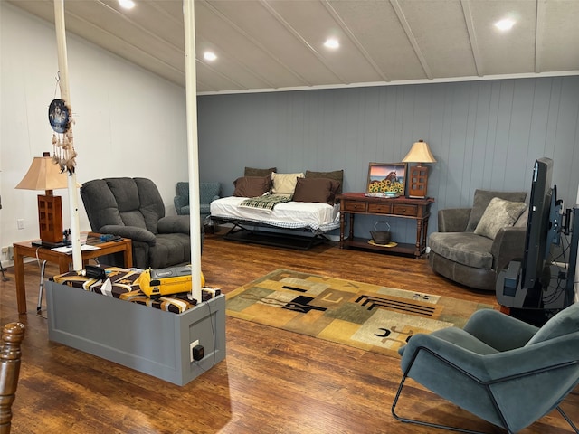 living room with lofted ceiling and dark hardwood / wood-style flooring