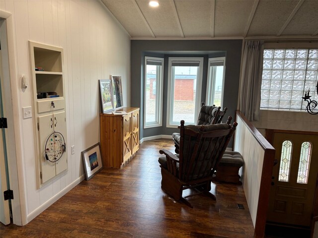 entrance foyer featuring dark hardwood / wood-style floors