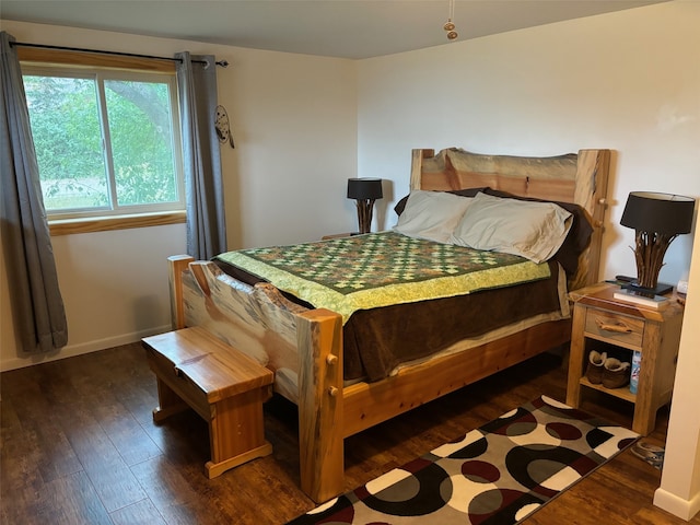 bedroom featuring dark hardwood / wood-style floors