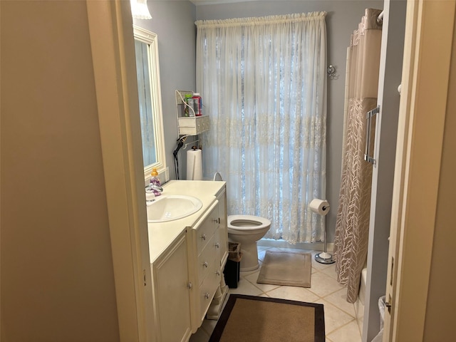 bathroom featuring toilet, vanity, shower / bath combination with curtain, and tile patterned floors