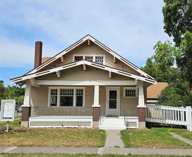 craftsman-style home featuring covered porch