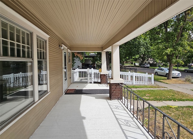 view of patio featuring a porch