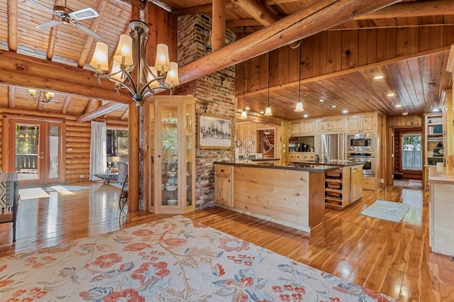 kitchen featuring ceiling fan with notable chandelier, wooden ceiling, hanging light fixtures, stainless steel appliances, and light wood-type flooring