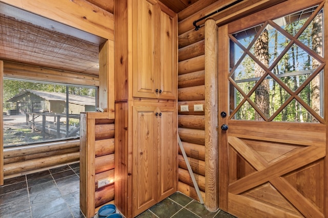 interior space featuring log walls