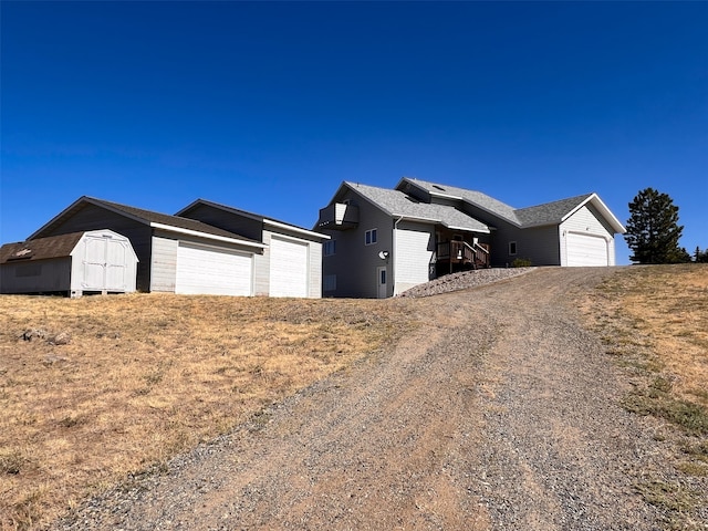 ranch-style house with a shed