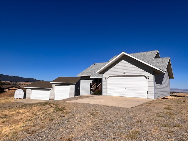 ranch-style home featuring a garage