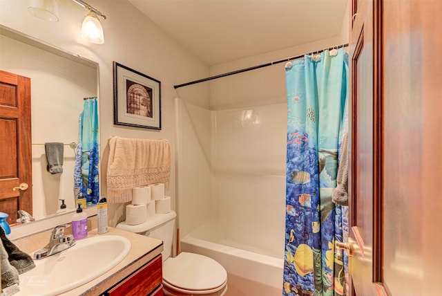 full bathroom with vanity, toilet, and shower / tub combo with curtain