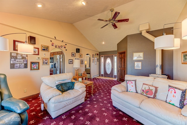 carpeted living room with high vaulted ceiling, ceiling fan, and a textured ceiling