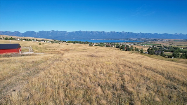 mountain view featuring a rural view