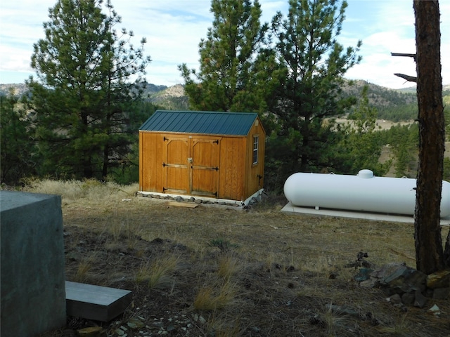 view of outdoor structure with a mountain view