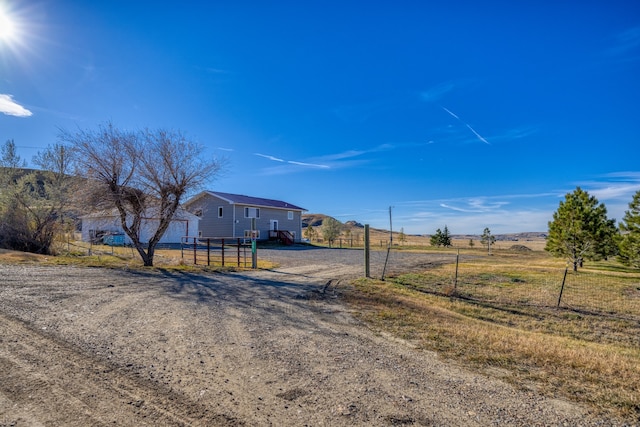 view of street featuring a rural view