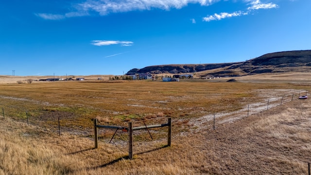 view of mountain feature with a rural view