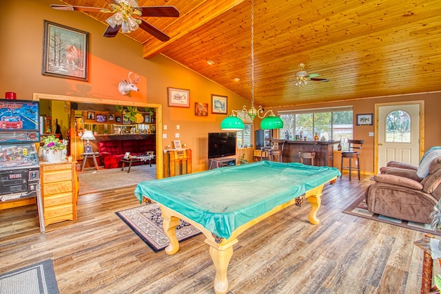 rec room with lofted ceiling with beams, billiards, ceiling fan, and bar