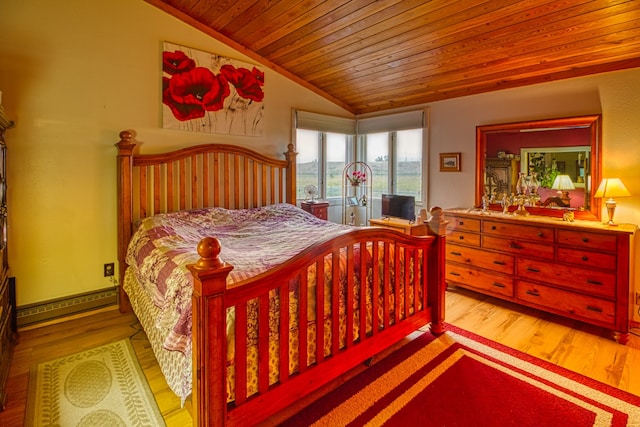 bedroom featuring wood ceiling, a baseboard radiator, light hardwood / wood-style floors, and vaulted ceiling