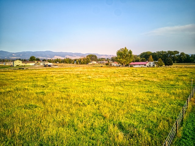 view of mountain feature with a rural view