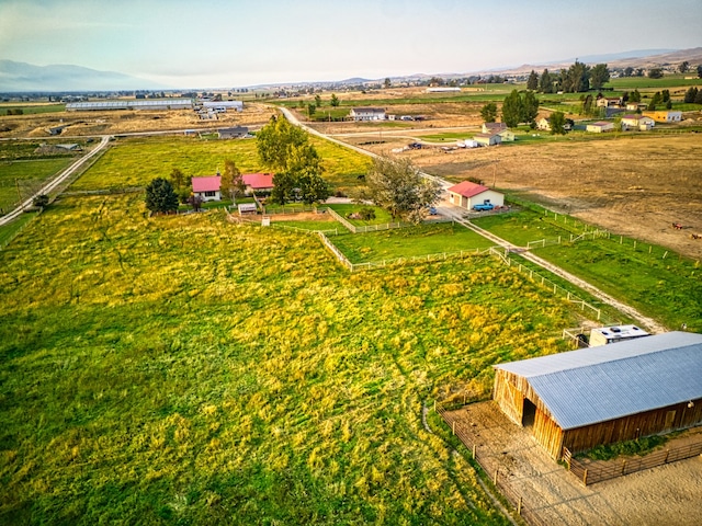 birds eye view of property featuring a rural view