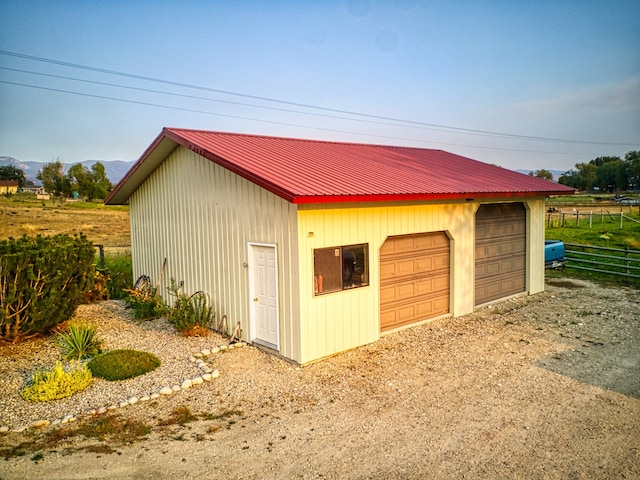 garage with wood walls