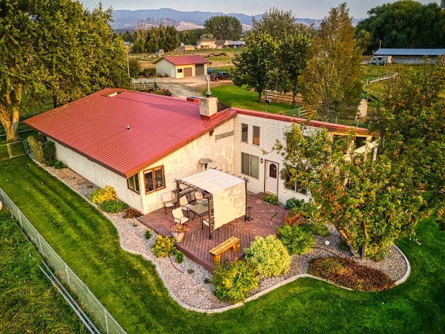 birds eye view of property with a mountain view