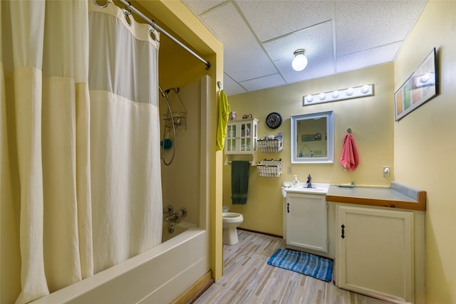 510 Johnson Ln, Superior, MT 59872 - full bathroom with a paneled ceiling, toilet, shower / bath combo, wood finished floors, and vanity