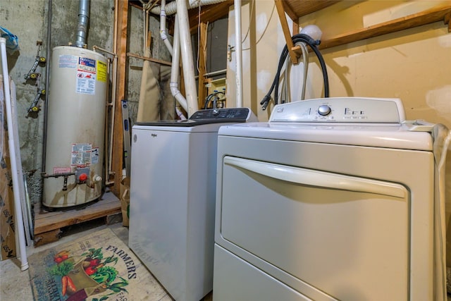 510 Johnson Ln, Superior, MT 59872 - laundry room with gas water heater and washing machine and clothes dryer