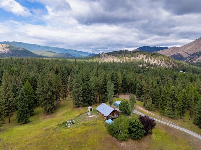 510 Johnson Ln, Superior, MT 59872 - aerial view of property and surrounding area featuring a forest and mountains