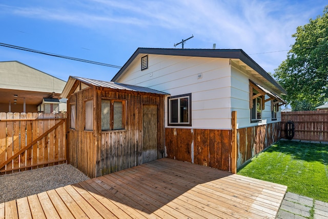 deck featuring a lawn