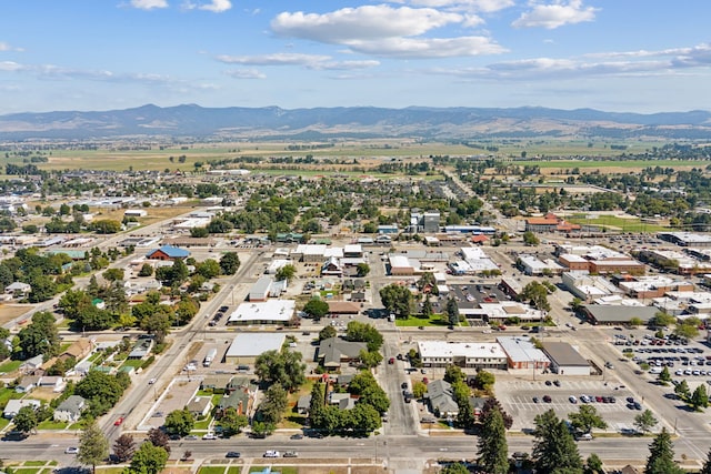 birds eye view of property featuring a mountain view