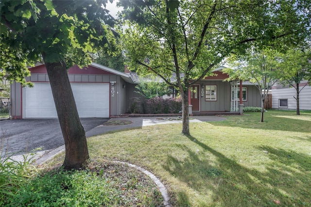 view of yard featuring a garage