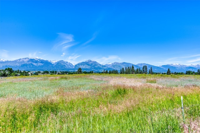 property view of mountains featuring a rural view