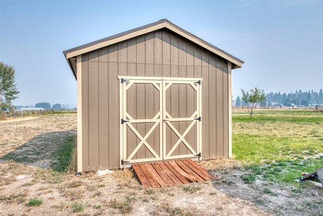 view of outdoor structure featuring a rural view