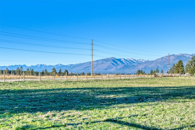 mountain view featuring a rural view