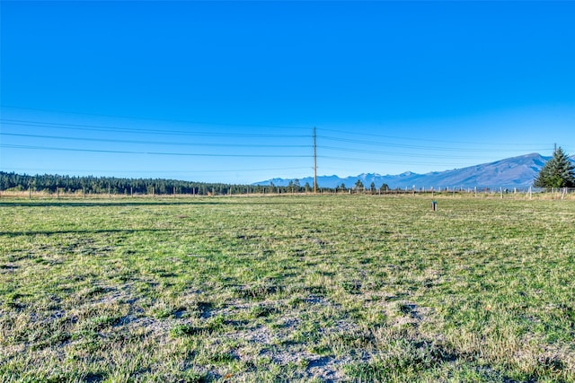 property view of mountains featuring a rural view