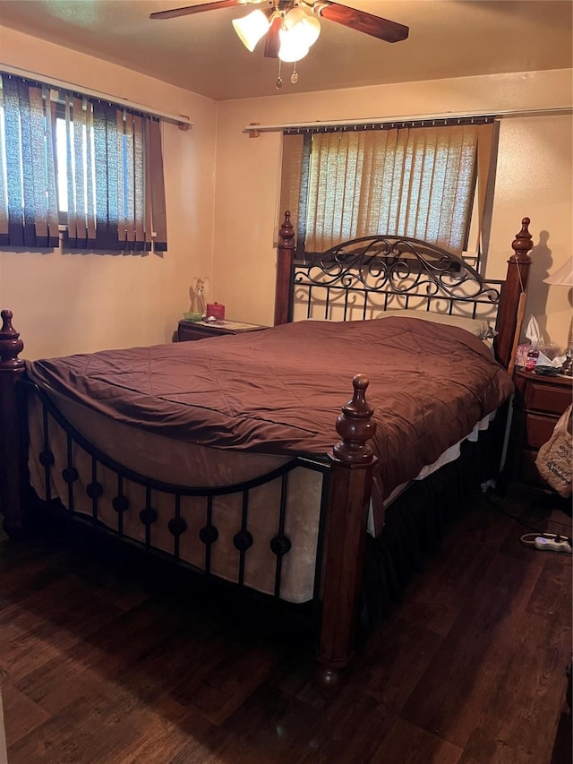 bedroom featuring ceiling fan and wood finished floors