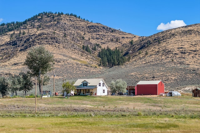 property view of mountains featuring a rural view