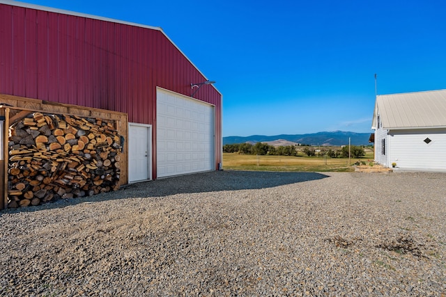 garage featuring a mountain view