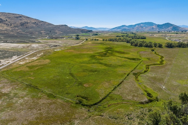 bird's eye view with a rural view and a mountain view