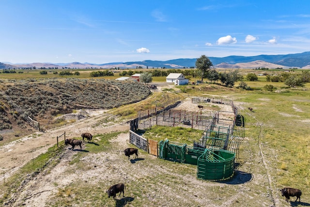 drone / aerial view with a mountain view and a rural view