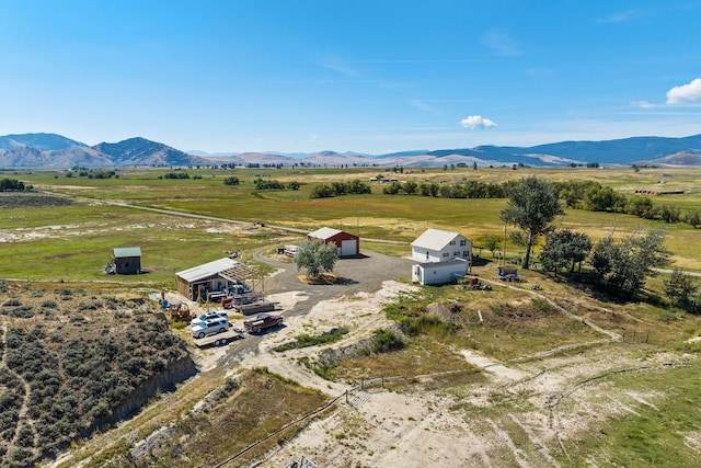 aerial view featuring a rural view and a mountain view