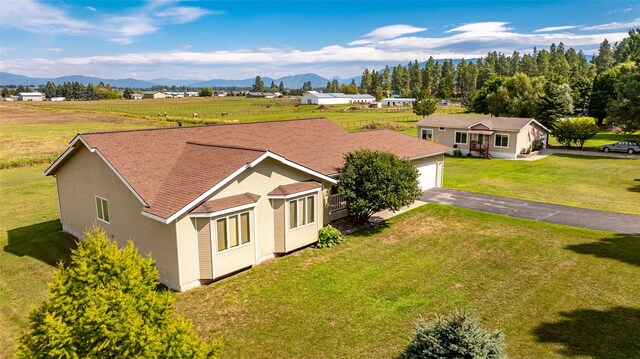 125 Ponderosa Ln, Kalispell, MT 59901 - drone / aerial view featuring a mountain view