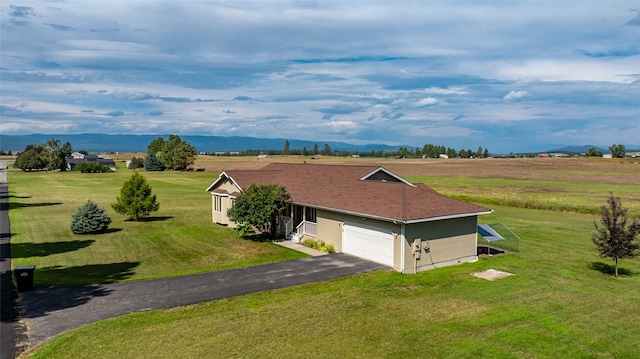 bird's eye view with a rural view and a mountain view