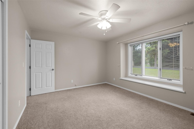125 Ponderosa Ln, Kalispell, MT 59901 - carpeted empty room with ceiling fan and baseboards