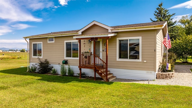 view of front of home featuring a front lawn