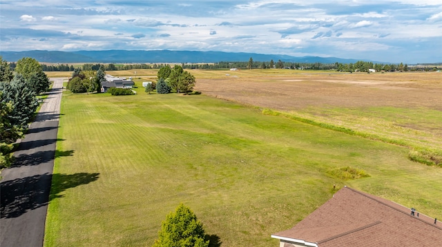 aerial view with a mountain view and a rural view