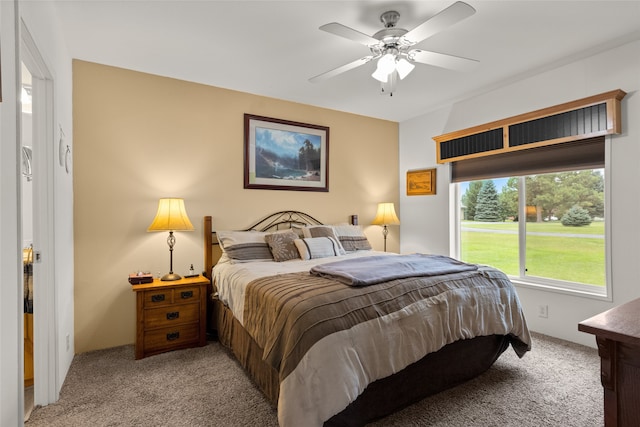 carpeted bedroom with ceiling fan